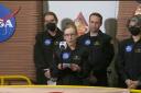 Kelly Haston, a crew member of the first CHAPEA mission, speaks in front of other members, from left to right, Ross Brockwell, Nathan Jones and Anca Selariu (Nasa via AP)