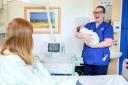 Lottery Winner Ruth continues to work as a midwife at Royal Albert Edward Infirmary in Wigan 10 years after becoming a £1m EuroMillions winner (Anthony Devlin/PA)