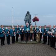 Members of the West Somerset Brass Band, with author Jill Newton centre right