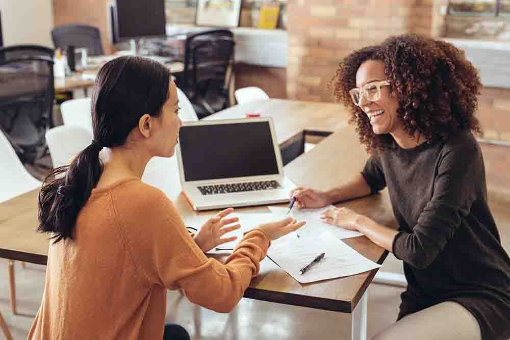 Two women talking