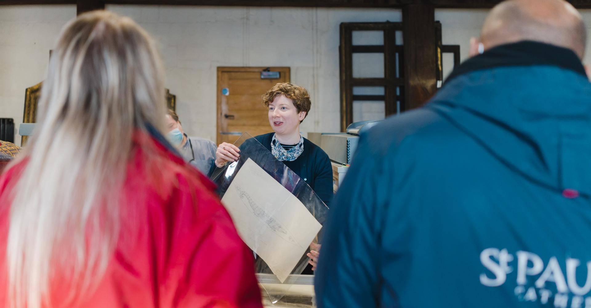 visitors being shown round the collections department