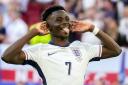 England’s Bukayo Saka celebrated scoring his penalty in the shoot-out win over Switzerland (Darko Vojinovic/AP)