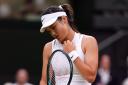 Emma Raducanu looks disappointed during her loss to Lulu Sun (John Walton/PA)