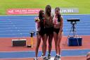 Delleah Belgrave (far right) on the podium with her silver medal