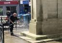 The town centre cenotaph being cleaned on the day of the 80th anniversary of D-day