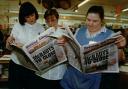 McIlroys staff Carol Larder, Gerry Guiry and Julie Bridges read of the shop's closure in the Adver, January 14, 1998.