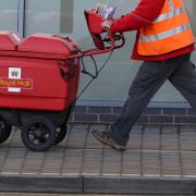 Royal Mail are urging owners to shut their pets away before answering the door