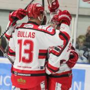 Swindon Wildcats celebrate a goal with captain Sam Bullas