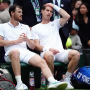Andy Murray and Jamie Murray following their defeat (Mike Egerton/PA)