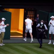 Andy Murray leaves Centre Court (John Walton/PA)