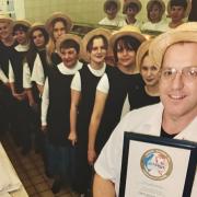 Nostalgic photos show the history of The Trawlerman chippy. In this 1998 image, manager Alan Clark and his team celebrate winning a quality award