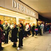 Shoppers queueing for a sale in December 1990