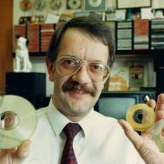 EMI Swindon general manager Richard Green with CDs and a microdisc in March 1989.