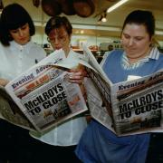 McIlroys staff Carol Larder, Gerry Guiry and Julie Bridges read of the shop's closure in the Adver, January 14, 1998.