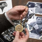 RWB Auctions Valuer Edd Thomas Examines Negatives From An Unpublished Muhammed Ali Advert