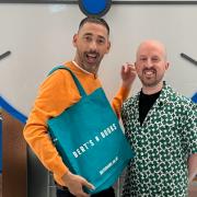 Alex Call and Countdown presenter Colin Murray in front of the iconic clock face.