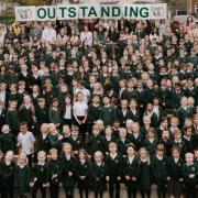 Pupils and staff celebrating at The Croft Primary School.