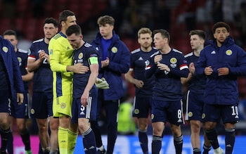 Euro 2020 - Group D - Croatia v Scotland - Hampden Park, Glasgow, Scotland, Britain - June 22, 2021 Scotland's Andrew Robertson looks dejected with teammates after the match