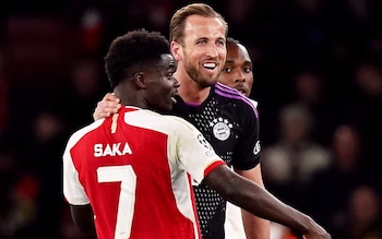 Bukayo Saka and Harry Kane chat at the final whistle