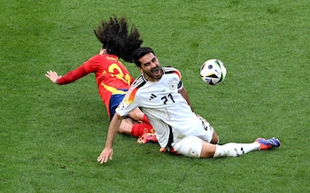  Ilkay Guendogan of Germany reacts after a challenge from Marc Cucurella