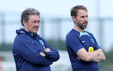 Gareth Southgate and John McDermott watch on as England players train