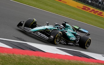 Aston Martin driver Lance Stroll of Canada steers his car during the first free practice at the Silverstone racetrack, Silverstone, England, Friday, July 5, 2024. The British Formula One Grand Prix will be held on Sunday