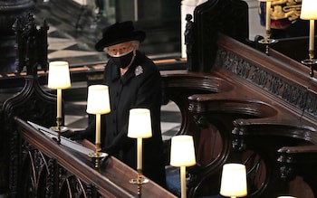 Queen Elizabeth II watches as pallbearers carry the coffin of Prince Philip, Duke Of Edinburgh into St Georgeâ  s Chapel by the pallbearers during the funeral of Prince Philip, Duke of Edinburgh at Windsor Castle on April 17, 2021 in Windsor, United Kingdom. Prince Philip of Greece and Denmark was born 10 June 1921, in Greece. He served in the British Royal Navy and fought in WWII. He married the then Princess Elizabeth on 20 November 1947 and was created Duke of Edinburgh, Earl of Merioneth, and Baron Greenwich by King VI. He served as Prince Consort to Queen Elizabeth II until his death on April 9 2021, months short of his 100th birthday. His funeral takes place today at Windsor Castle with only 30 guests invited due to Coronavirus pandemic restrictions.