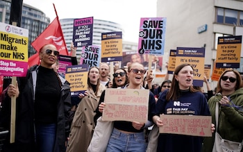 NHS workers on the picket line outside St Thomas' Hospital as strike action continues