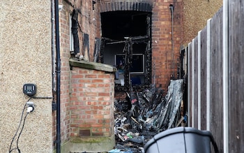 Burnt out window at rear of Mike Freer’s office in Finchley as police launch investigation into suspected arson attack at office