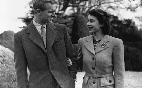 Princess Elizabeth and Prince Philip enjoy a walk during their honeymoon at Broadlands, Romsey, Hampshire