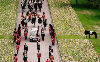 Queen Elizabeth's fell pony, Emma, stood patiently waiting for her as she returned home to Windsor for a final time on Monday