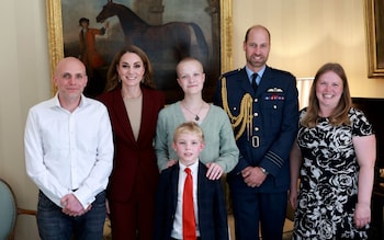 The Prince and Princess of Wales meet young photographer Liz Hatton and family at Windsor Castle