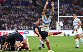 Alex Mitchell kicks for England v Argentina at the World Cup