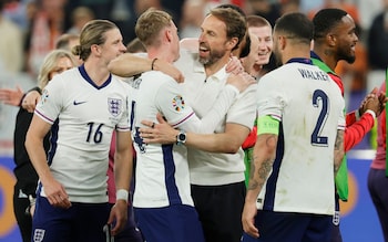 Gareth Southgate hugs player Cole Palmer after winning the Uefa Euro 2024 semi-final match against the Netherlands