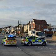 Busy A-road closed following car crash