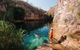 Two men swimming at Maguk in Kakadu