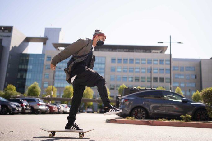 Shawn Connolly skateboards in front of the UCSF Medical Center at Mission Bay.