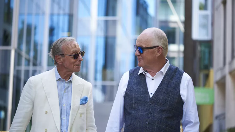 Two Freemasons walking in central London