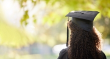 Graduate in cap and gown