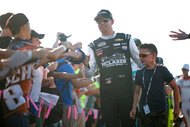 Kyle Busch, driver of the #8 McLaren Custom Grills Chevrolet, greets fans with his son, Brexton Busch