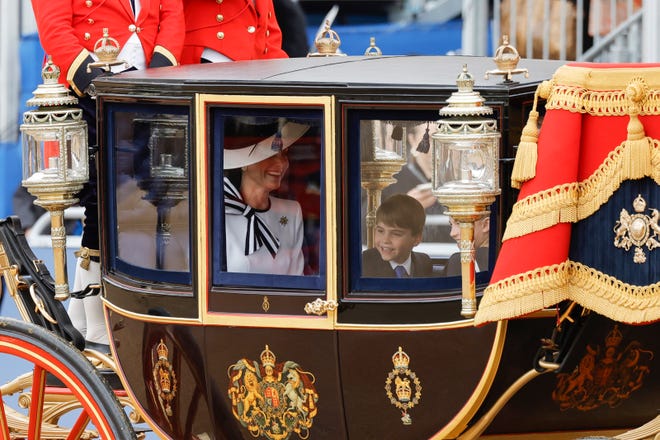 Princess Kate and her son, Prince Louis, during Trooping the Colour at Horse Guards Parade on June 15, 2024 in London. Crowds lining the streets waved and cheered as the carriage went past.