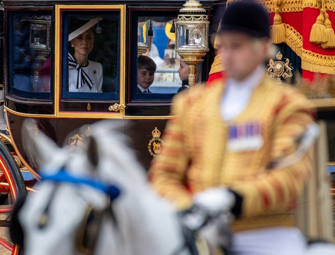 Britain's Catherine, Princess of Wales, Princess Charlotte and Prince Louis arrive for the Trooping the Colour parade which honours Britain's King Charles on his official birthday, in London, Britain, June 15, 2024. REUTERS/Chris J. Ratcliffe