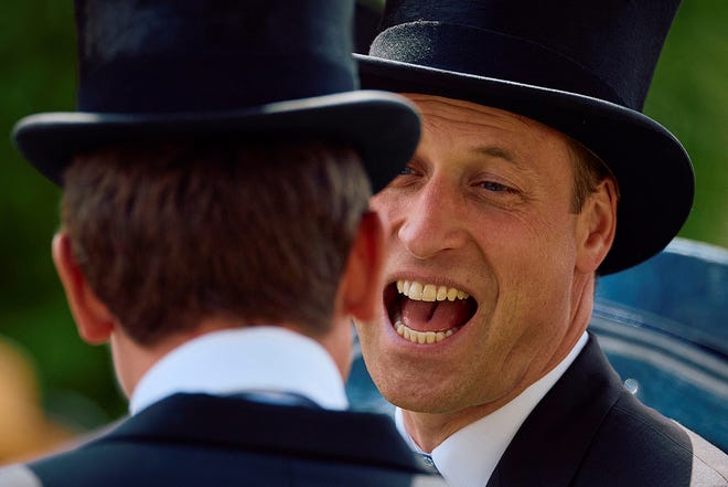 Britain's Prince William, Prince of Wales speaks with guests upon arrival on the second day of the Royal Ascot horse racing meeting, in Ascot, west of London, on June 19, 2024.