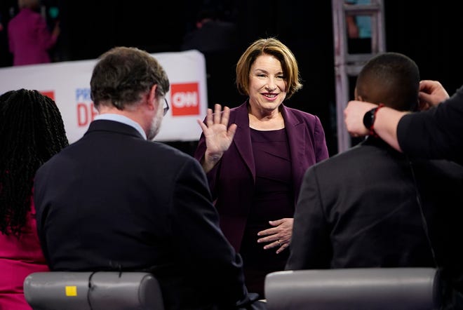 Sen. Amy Klobuchar (D-Minn) waves goodbye following a media interview at Georgia Tech’s McCamish Pavilion prior to the CNN Presidential Debate between President Joe Biden and former President Donald Trump held at CNN's studios in Atlanta.