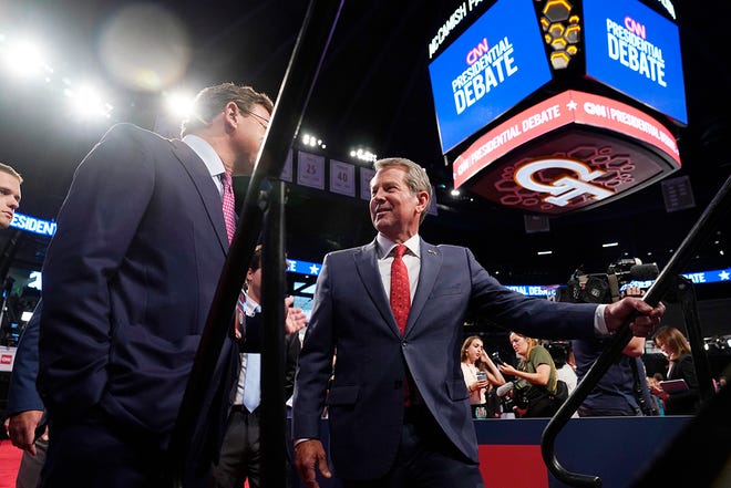 Georgia Republican Gov. Brian Kemp speaking to the media as Georgia Tech’s McCamish Pavilion hosts media in the Spin Room prior to the CNN Presidential Debate between President Joe Biden and former President Donald Trump held at CNN's studios in Atlanta on Jun 26, 2024.