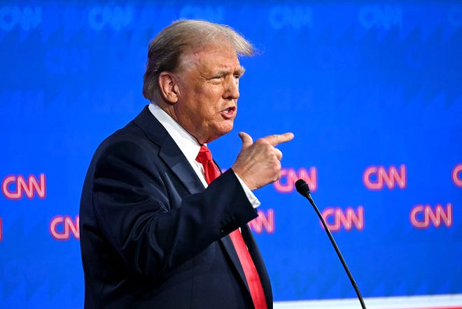 Former President Donald Trump speaks at the first presidential debate of the 2024 elections with President Joe Biden in Atlanta on June 27, 2024.