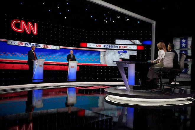 Democrat candidate, U.S. President Joe Biden, and Republican candidate, former U.S. President Donald Trump, attend a presidential debate in Atlanta, Georgia.