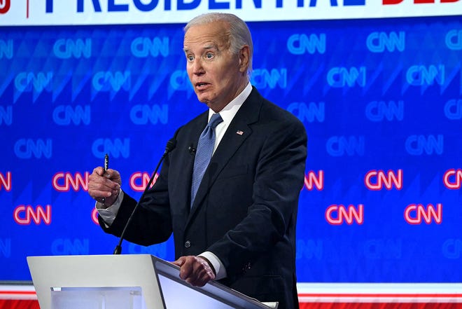 US President Joe Biden speaks as he participates in the first presidential debate of the 2024 elections with former US President and Republican presidential candidate Donald Trump at CNN's studios in Atlanta, Georgia, on June 27, 2024.