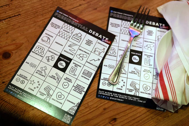 Bingo cards are set out ahead of the CNN presidential debate between U.S. President Joe Biden and Republican presidential candidate former President Donald Trump at a debate watch party at Shaws Tavern on June 27, 2024 in Washington, DC. Biden and Trump are facing off in the first presidential debate of the 2024 presidential cycle.