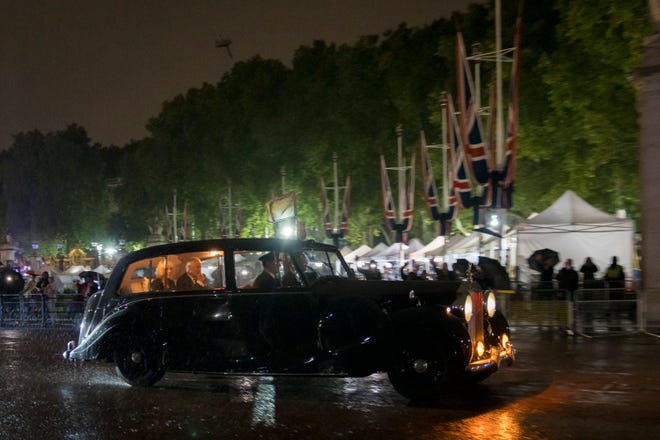 King Charles III and Queen Consort Camilla leave Buckingham Palace in a Rolls-Royce Phantom IV after the casket of Queen Elizabeth II arrived there, in London, England on September 13, 2022. Queen Elizabeth II, Britain's longest-reigning monarch, died after 70 years on the throne.